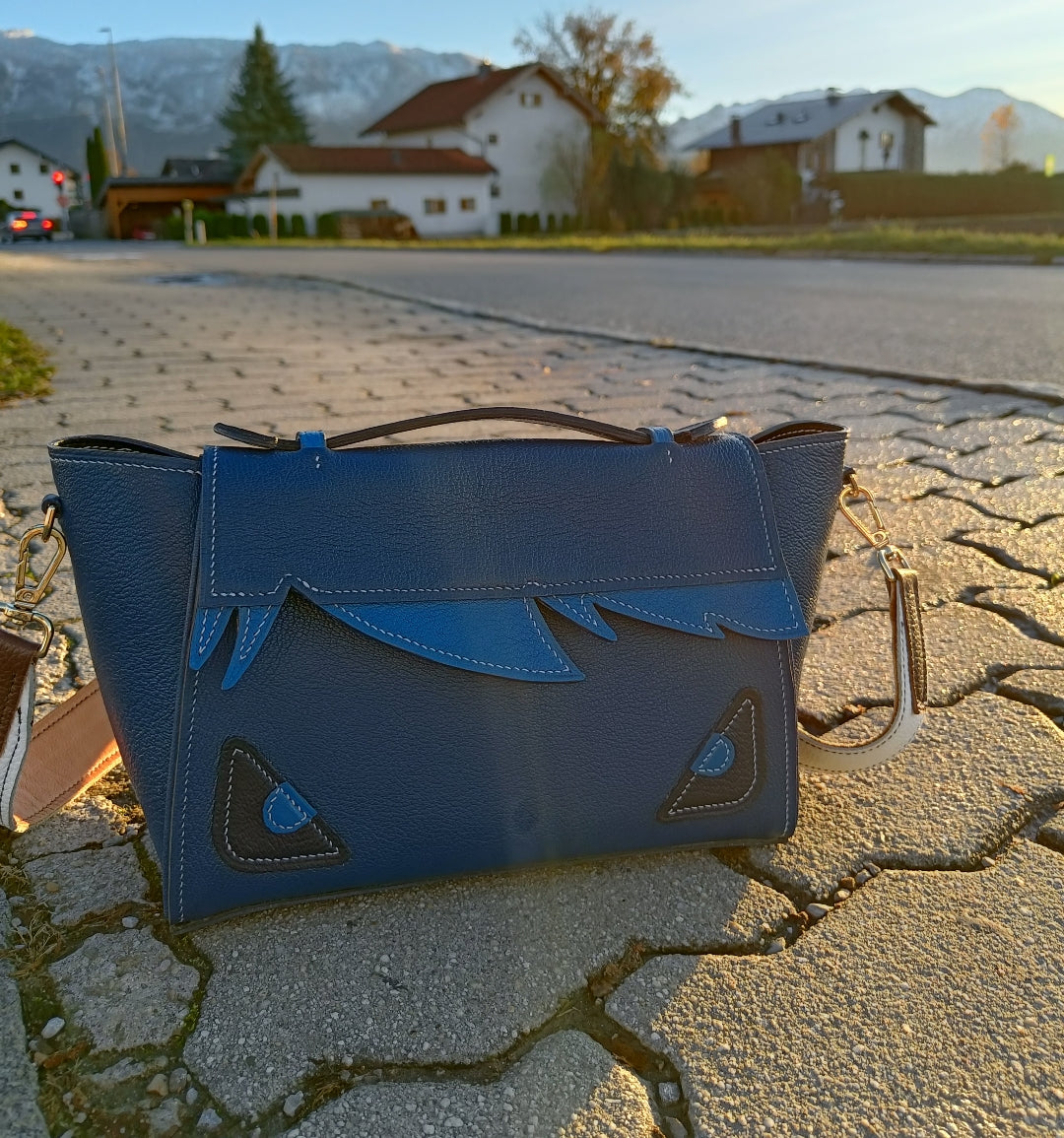 Staring monster bag